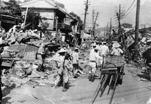 Residents beginning to clean the wreckage